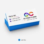 stack of 32pt painted edge business cards showing thickness and color layers